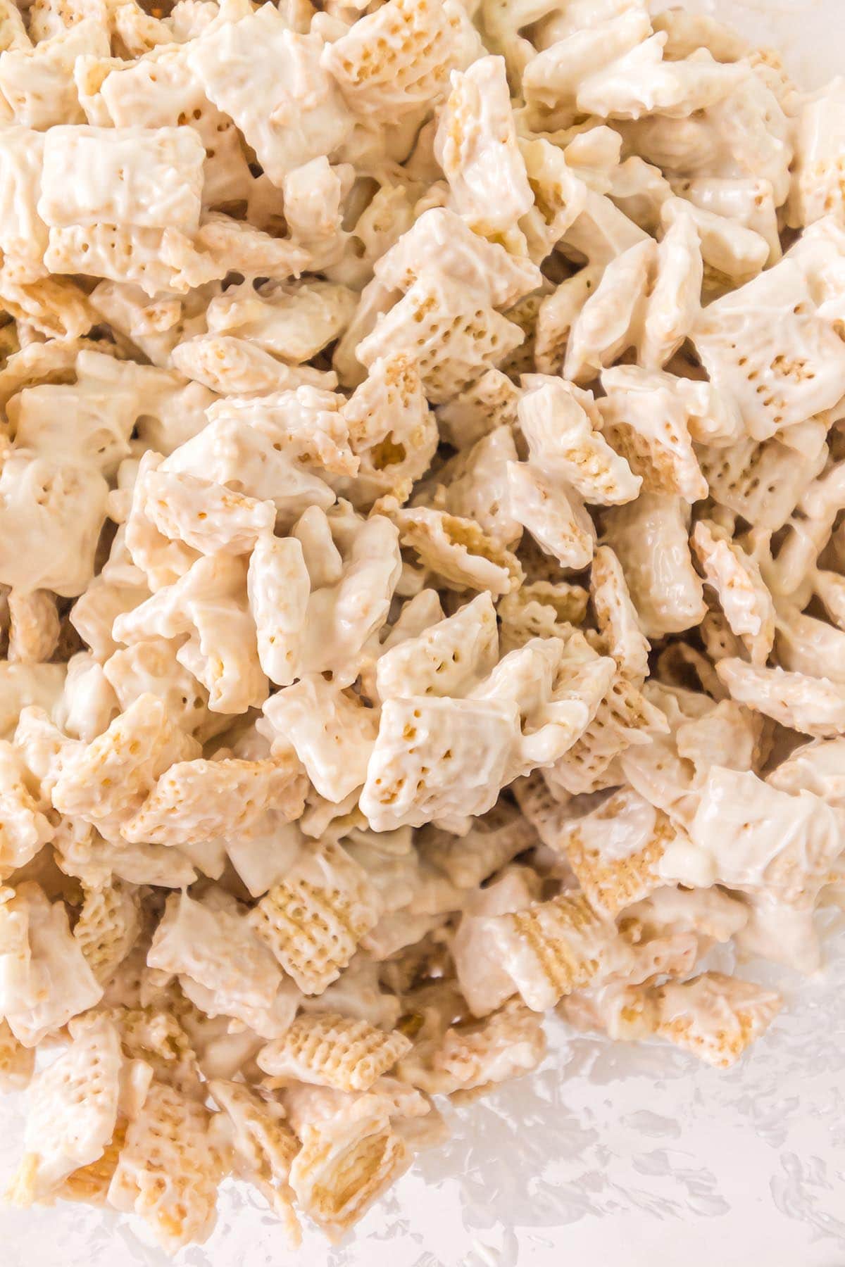 mix chex mix and almond bark. 