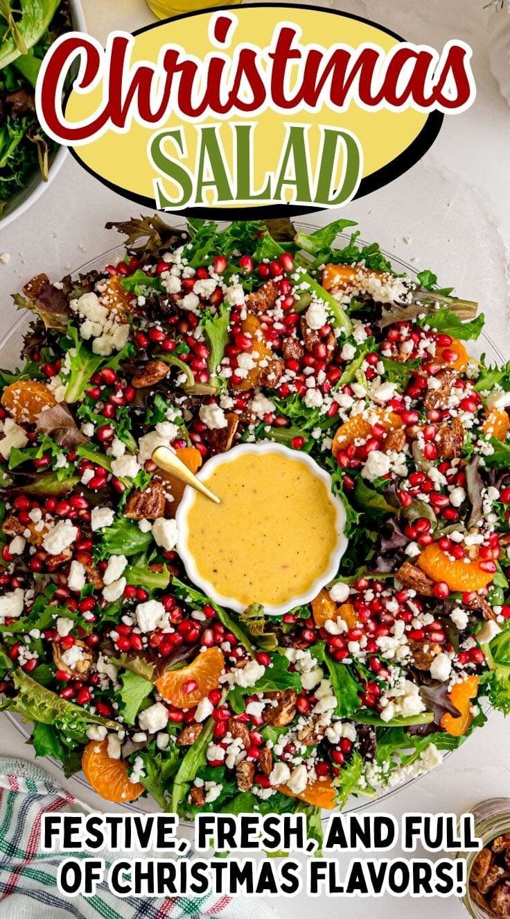 Vibrant Christmas Salad on a white table with a piece of tea cloth beside it