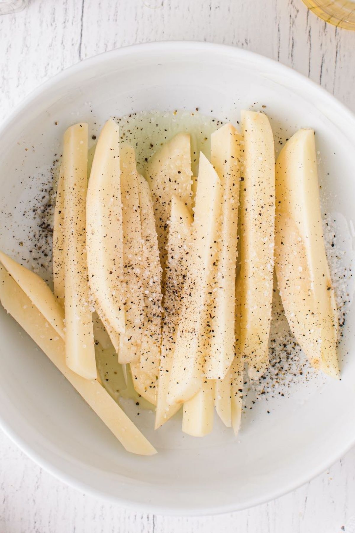 cut potatoes and mix with salt pepper and oil. 