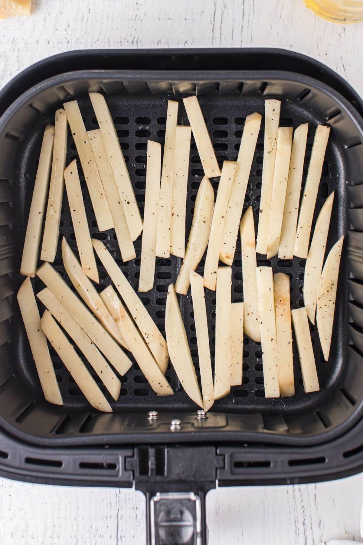 place potatoes in air fryer basket. 