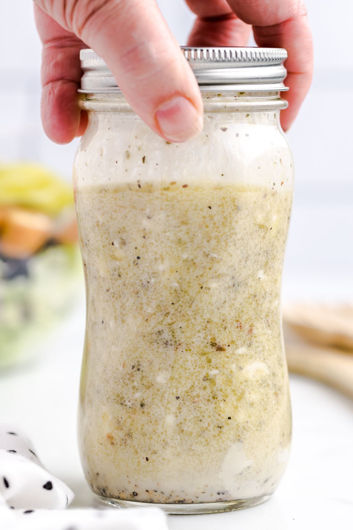 mix dressing ingredients in a mason jar and shake well. 