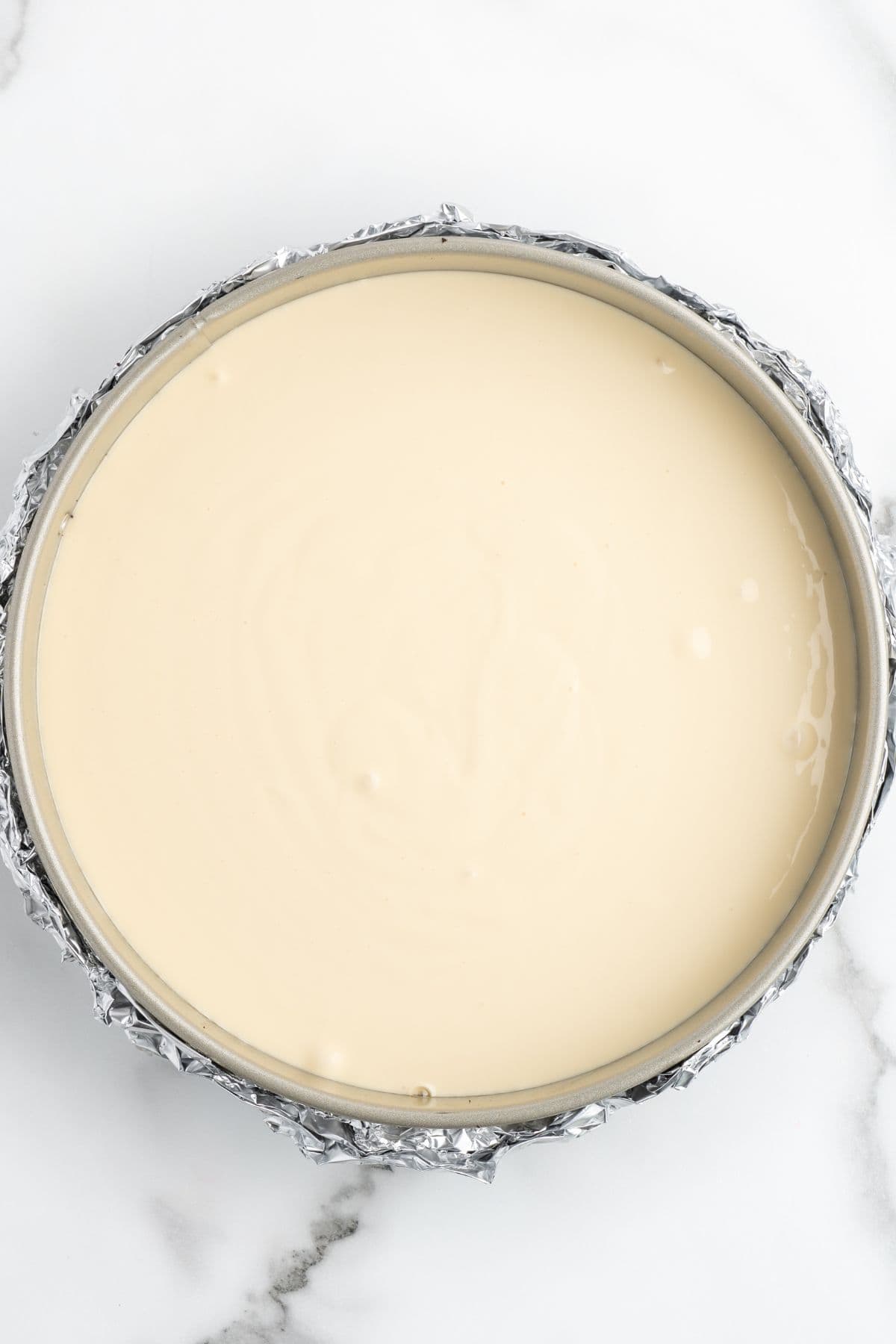 pour cheesecake mixture on top of the oreo crumbs.