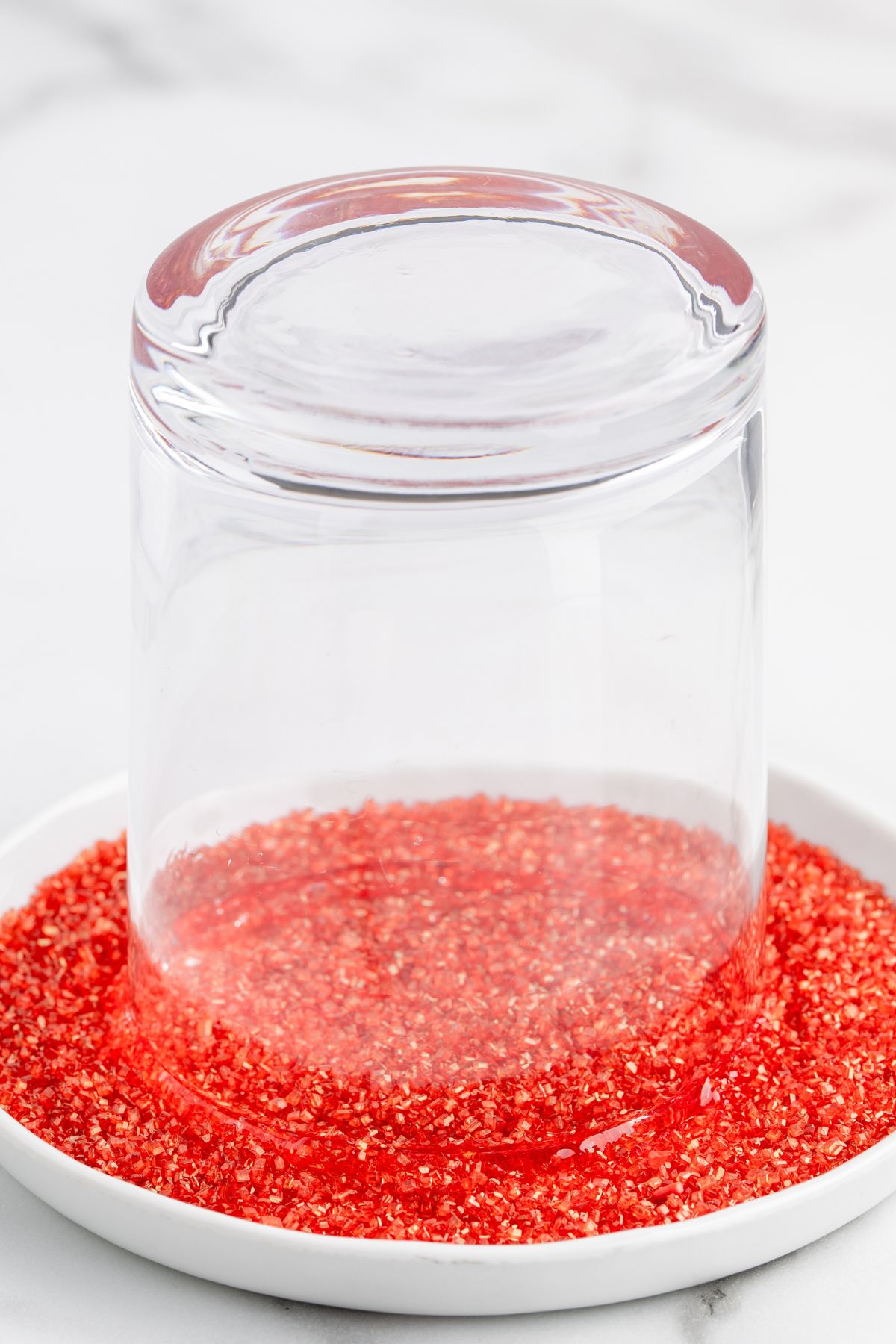 dip the glass rim inside sanding sugar. 