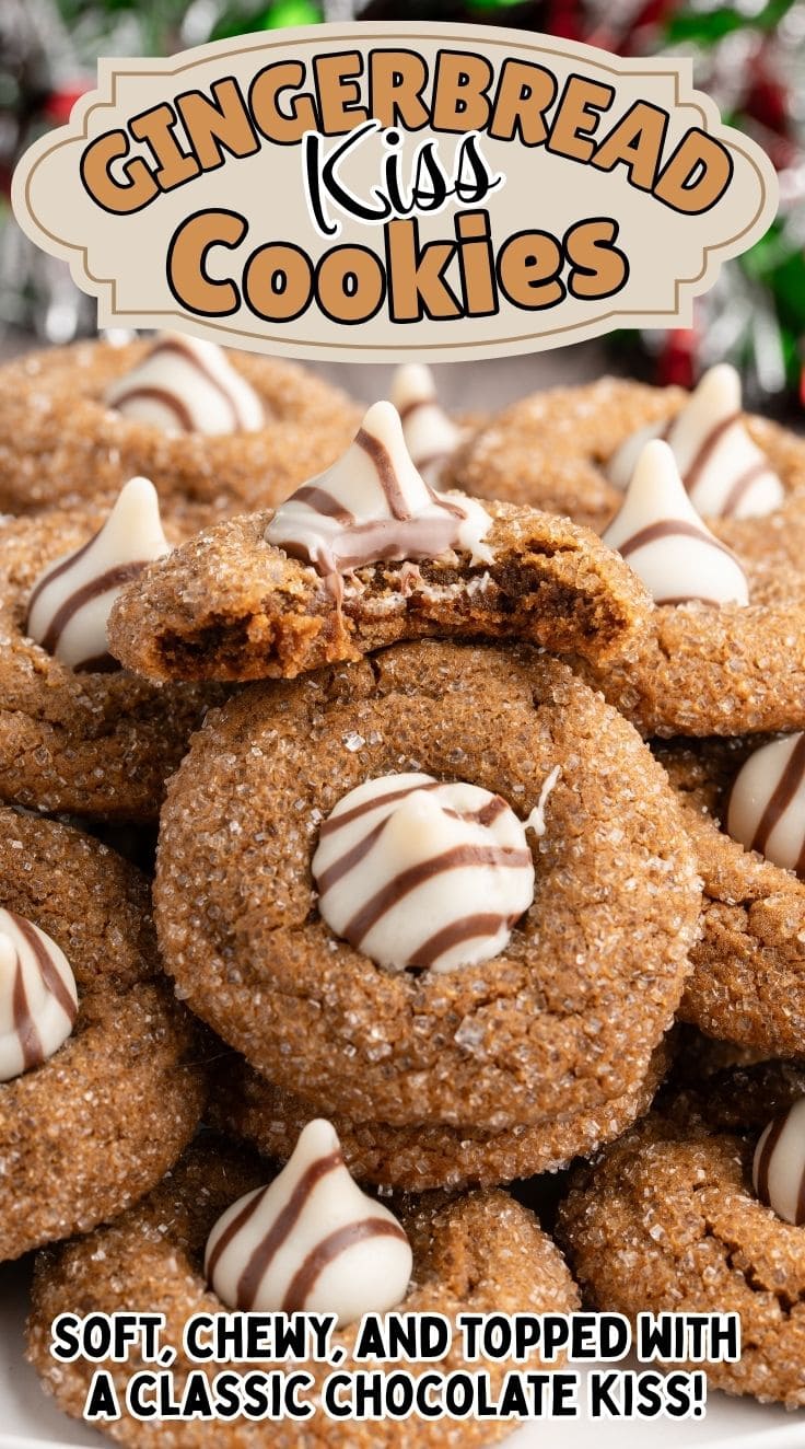 gingerbread cookies with a hershey hug kiss on top. The top cookie has a bit out of it.