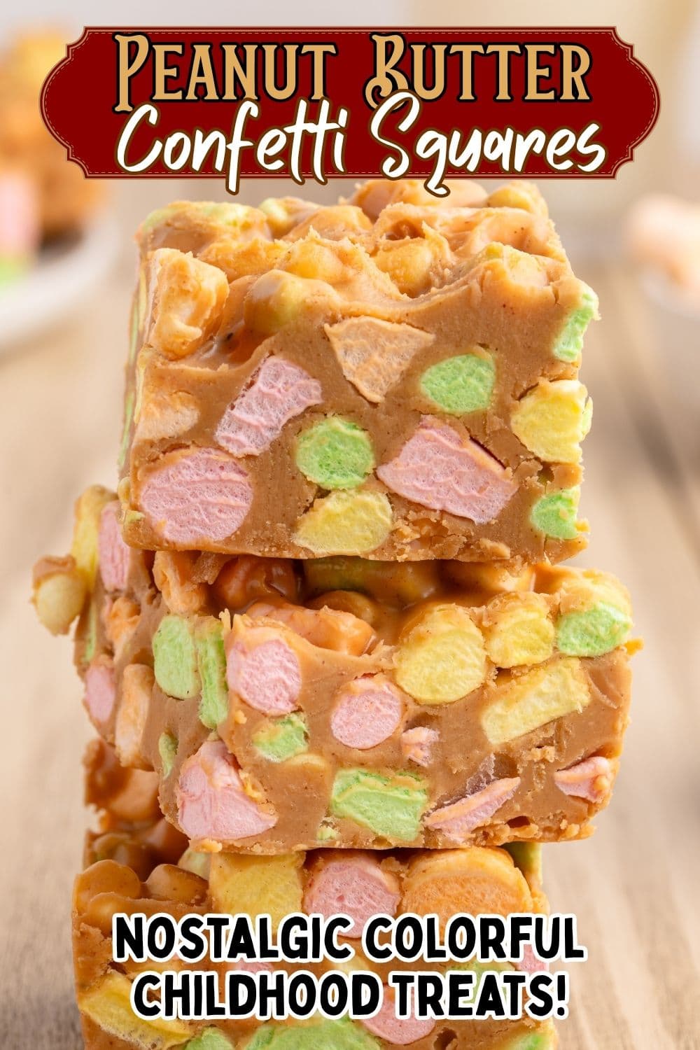 peanut butter marshmallow squares stacked on top of each other.