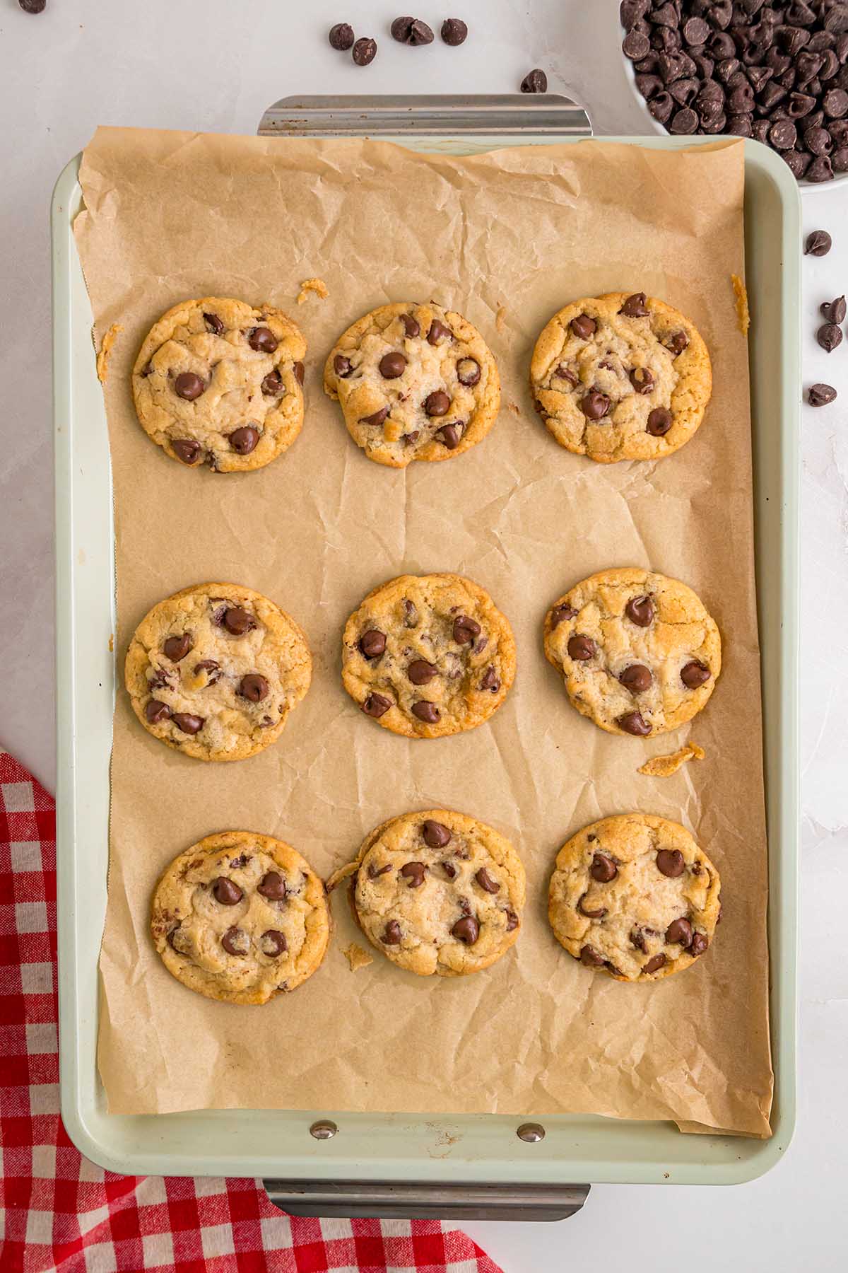 eggless chocolate chip cookies on baking sheet.