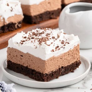 french silk brownies on a plate.