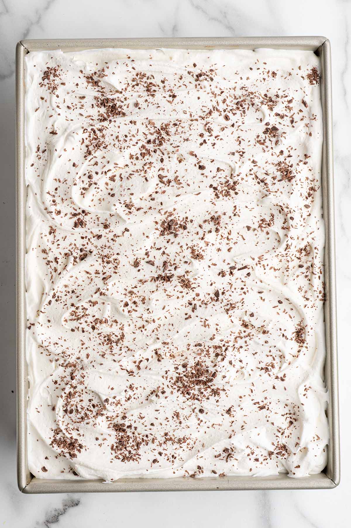 top with cool whip and add chocolate shavings.
