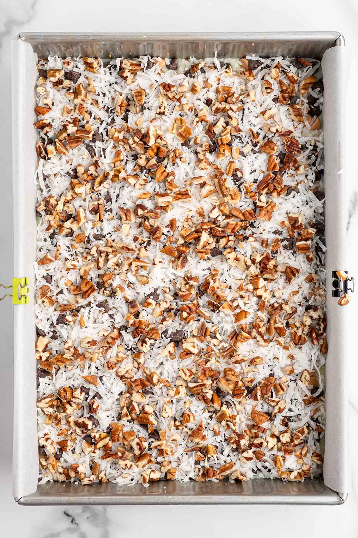 layer all the other ingredients on top of the graham cracker crumbs. 