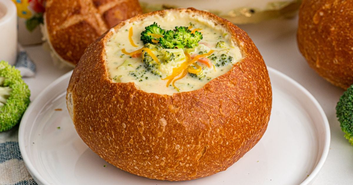 Creamy panera broccoli cheddar soup made with tender broccoli and sharp cheddar in a bread bowl served on a plate