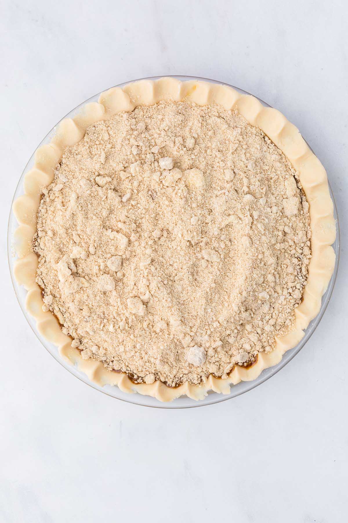 sprinkle the crumbs on top of the mixture.