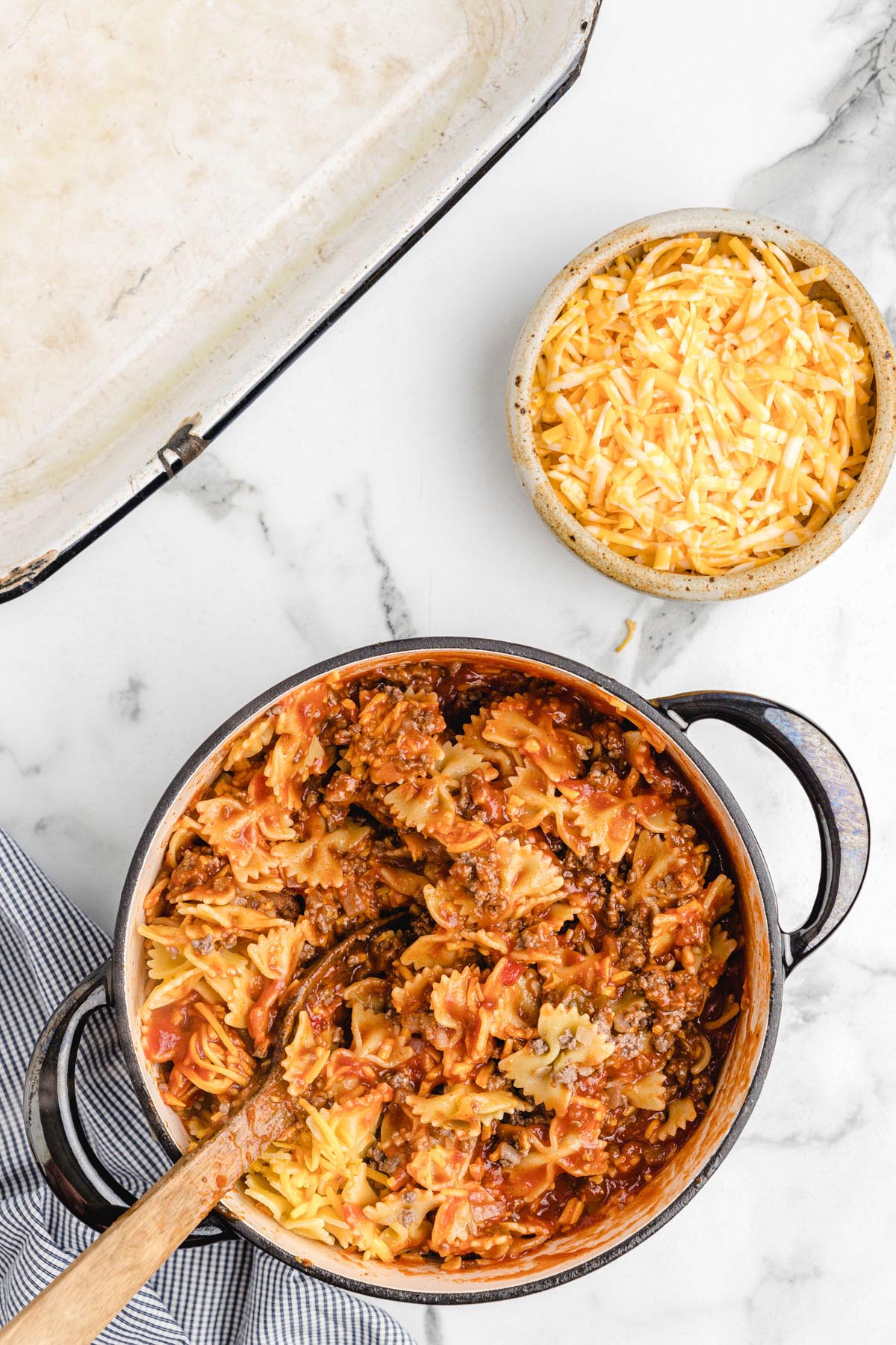 mixing ingredients in a pot.