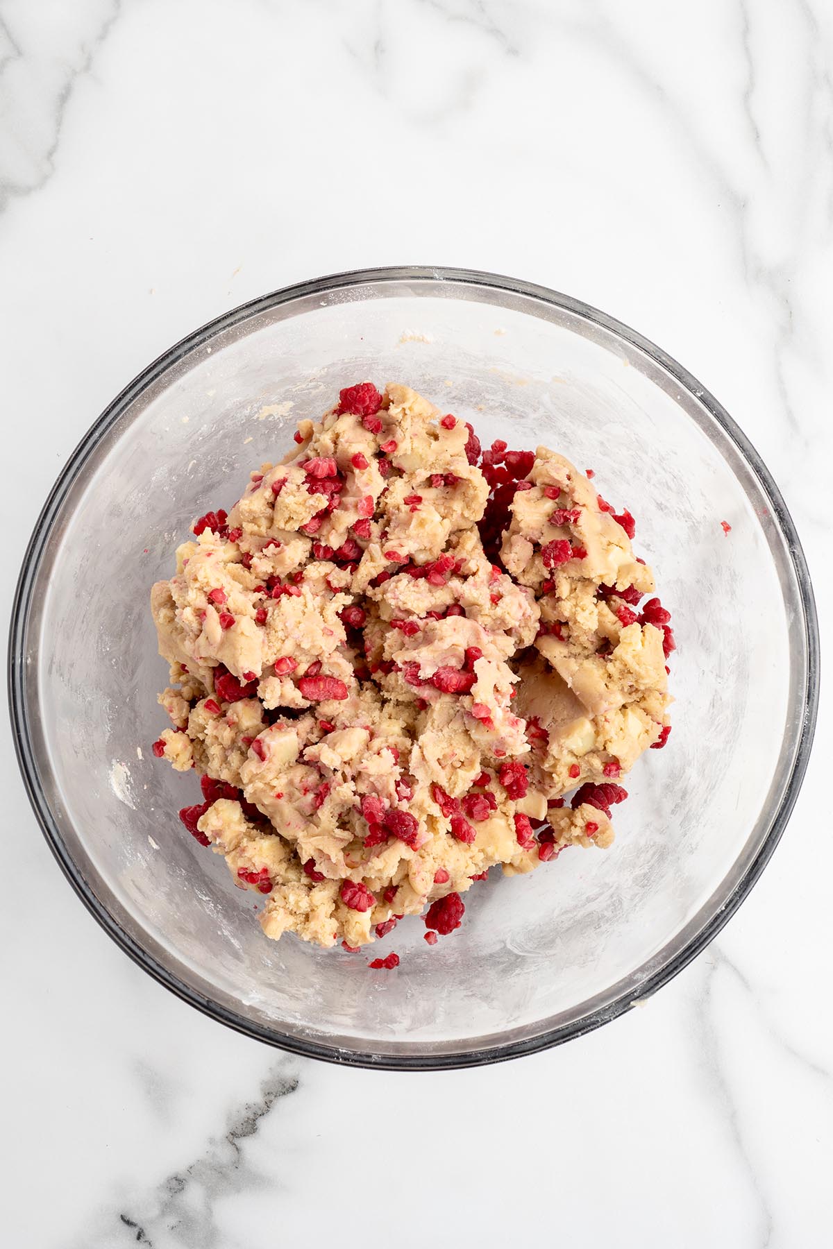 add raspberries into the cookie dough mixture.