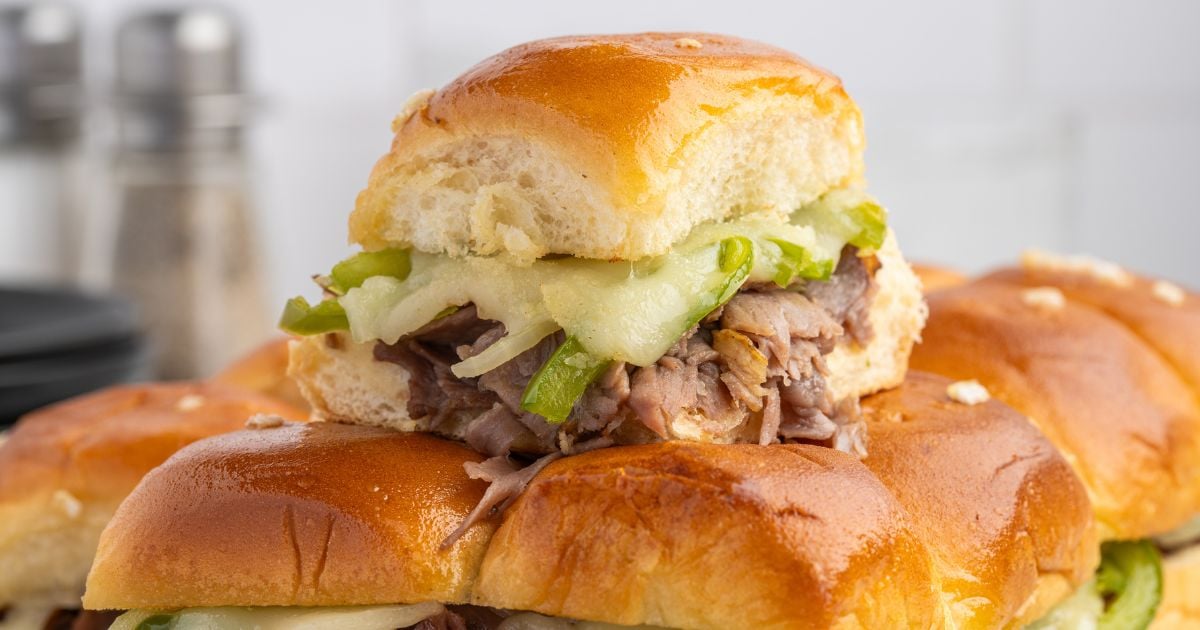 Philly Cheese Steak Sliders made from tender steak, melted provolone, and peppers.