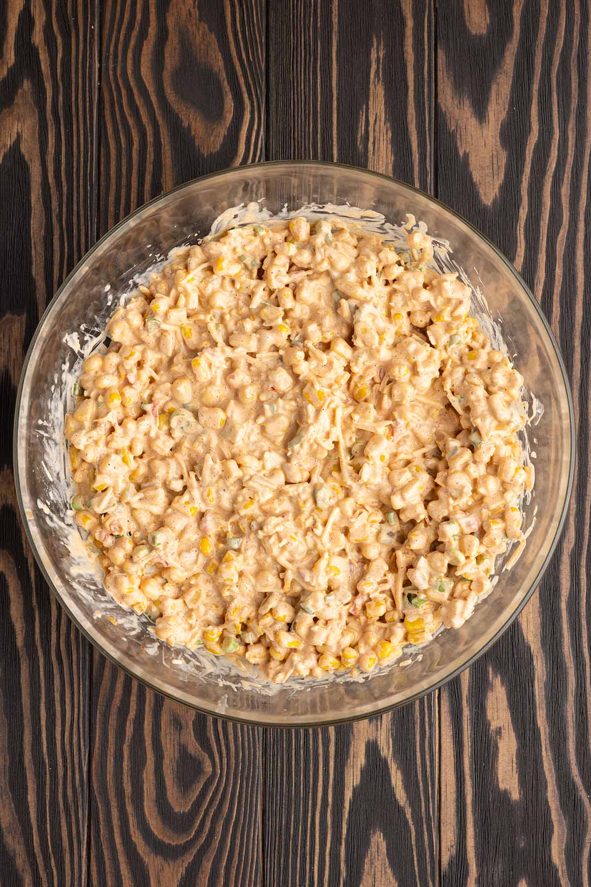 add the corn, jalapenos and other ingredients into the bowl and mix well. 