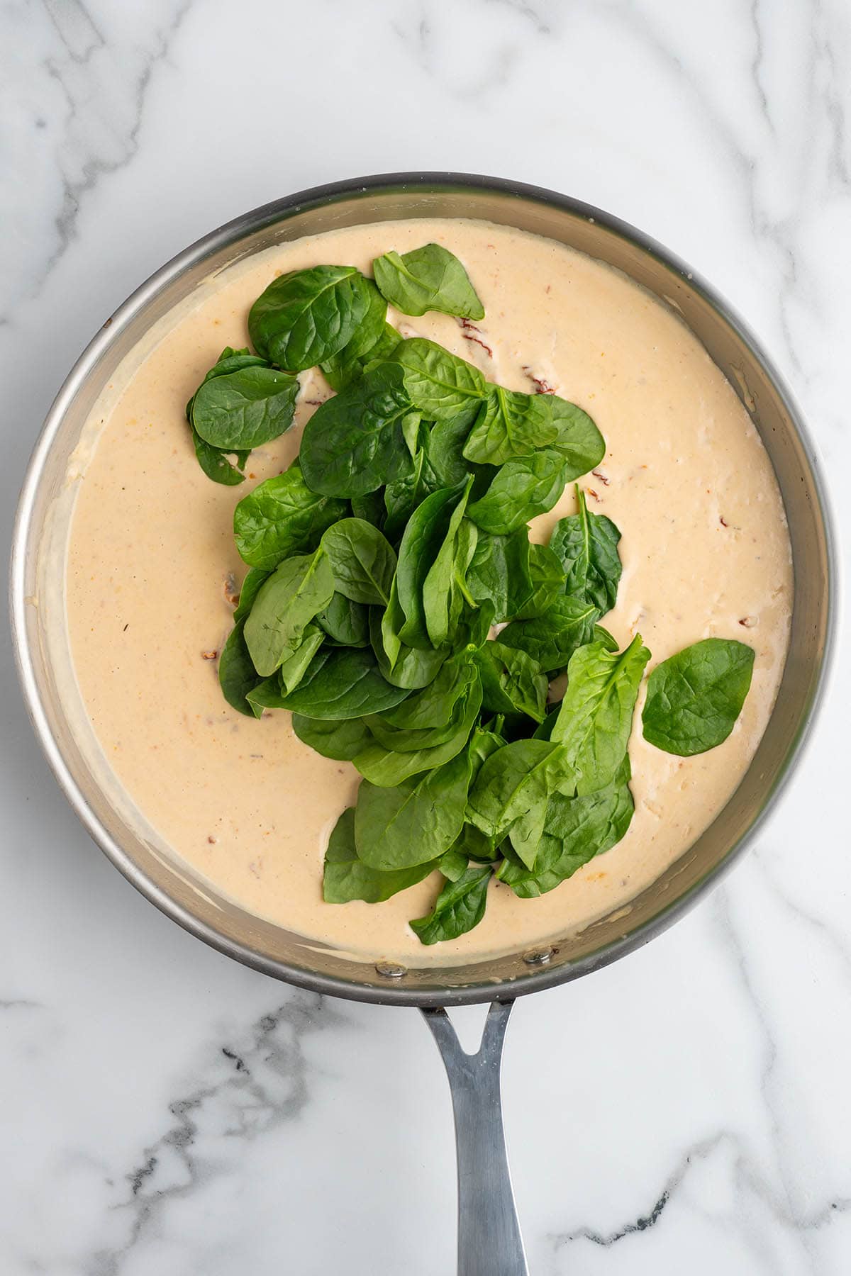 add the spinach into the sauce