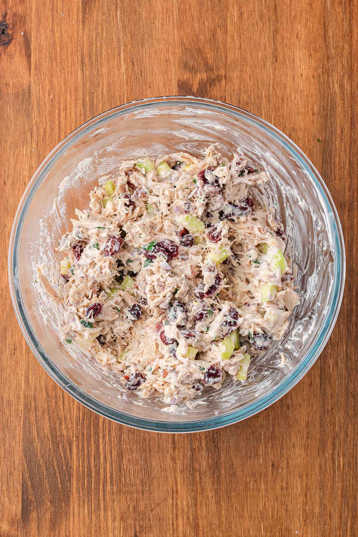 mix the dressing and the salad in the bowl.