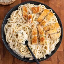 creamy chicken pasta on a plate.