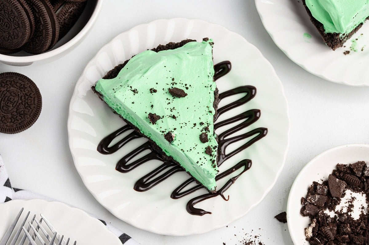 A slice of grasshopper pie on a plate.