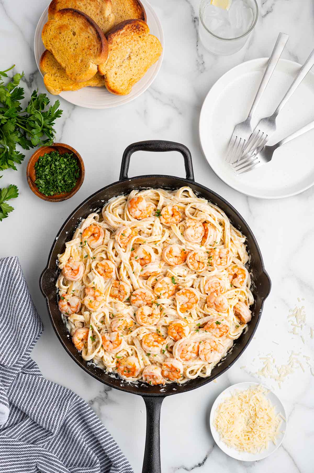 mix the pasta and the shrimp in the skillet.