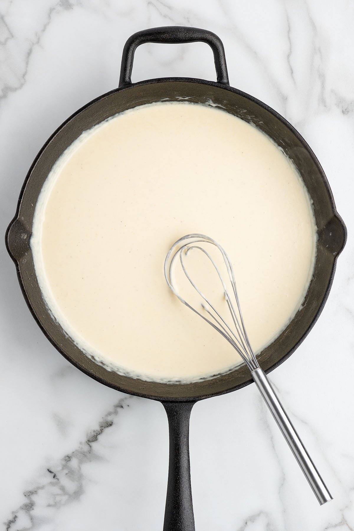 make the alfredo sauce in a skillet.