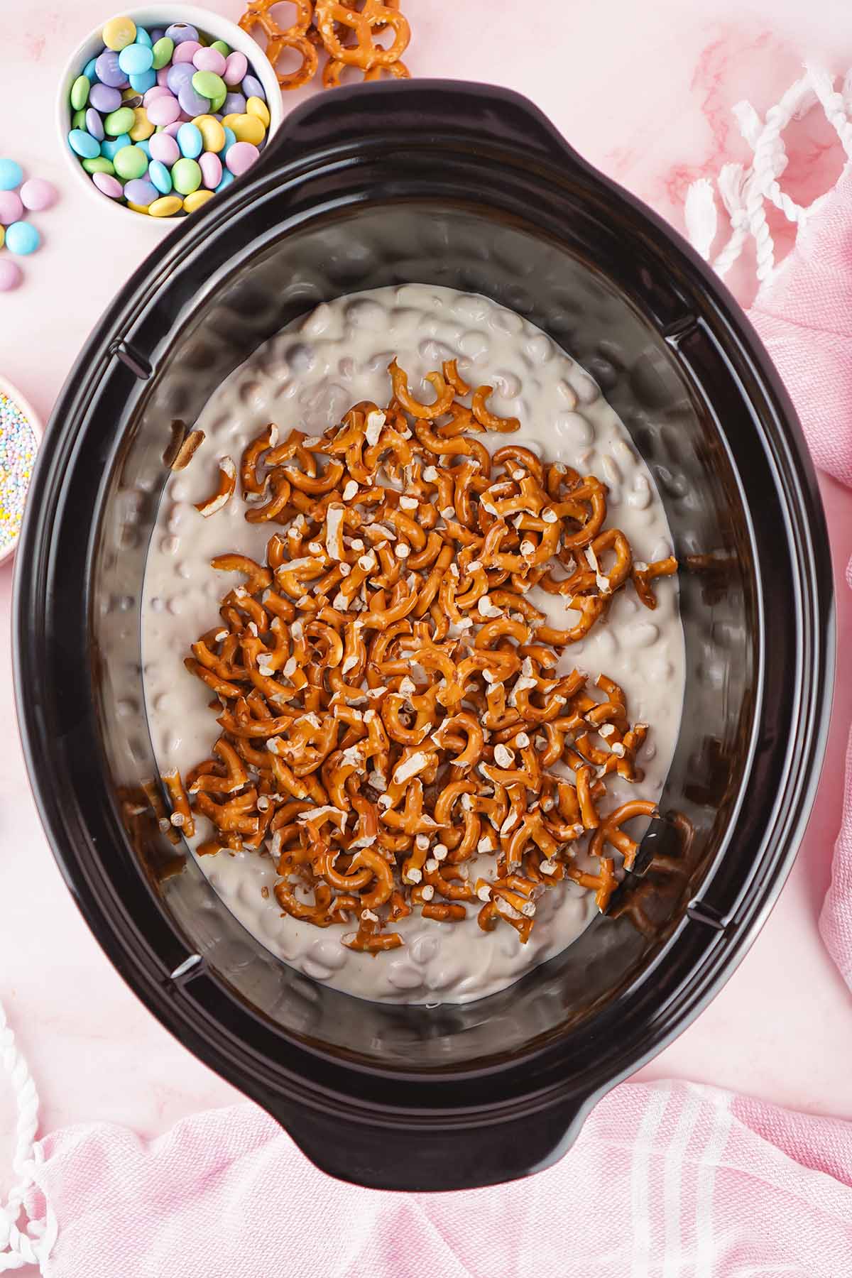 melt the chocolate and add pretzel sticks. 