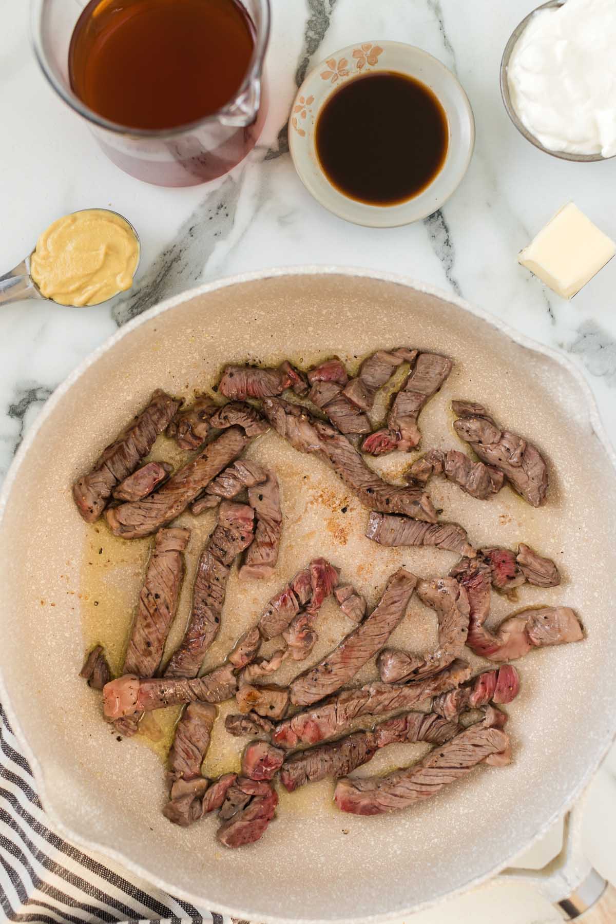 cook the beef in the skillet. 