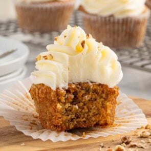 bitten carrot cake cupcake.