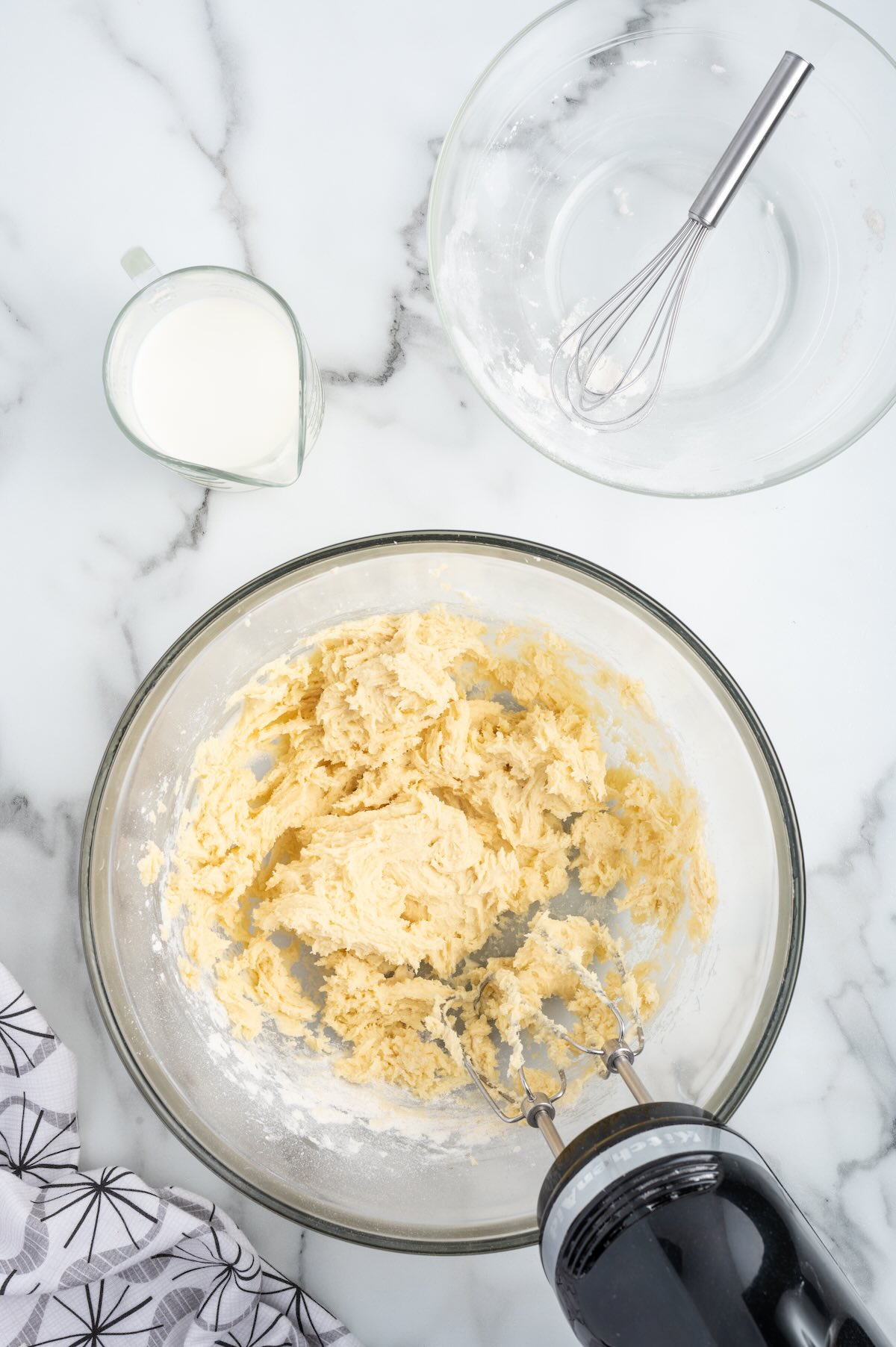 mix the ingredients in the bowl with mixer. 