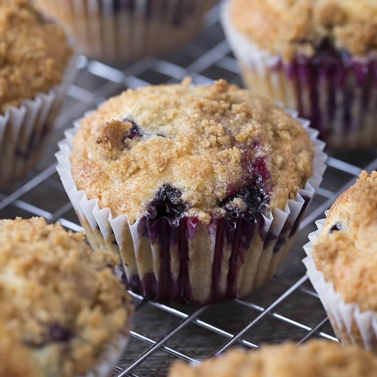 Blueberry muffins with a crumb topping.