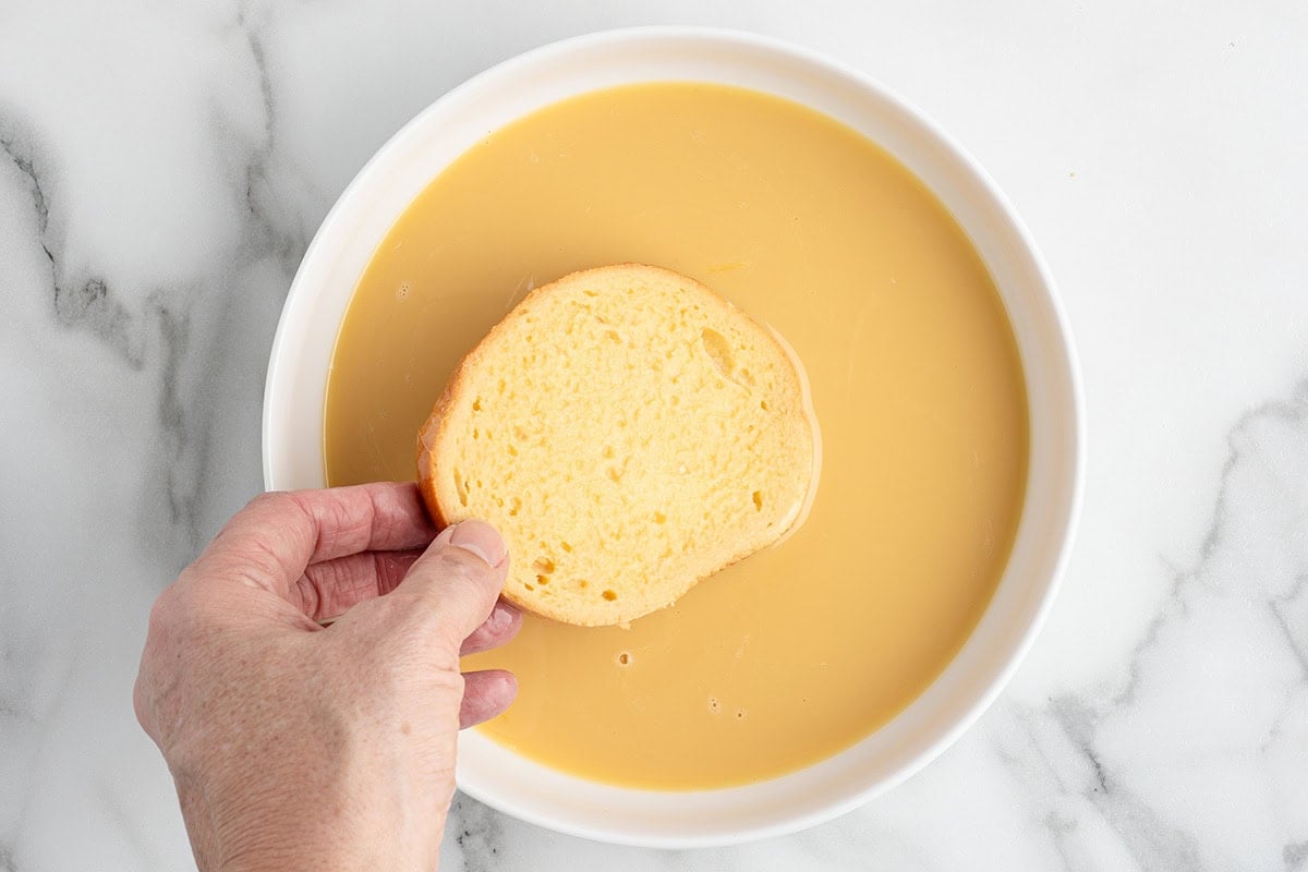 dip the bread into the custard mixture. 