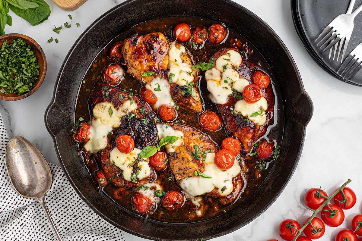 Balsamic chicken on skillet.
