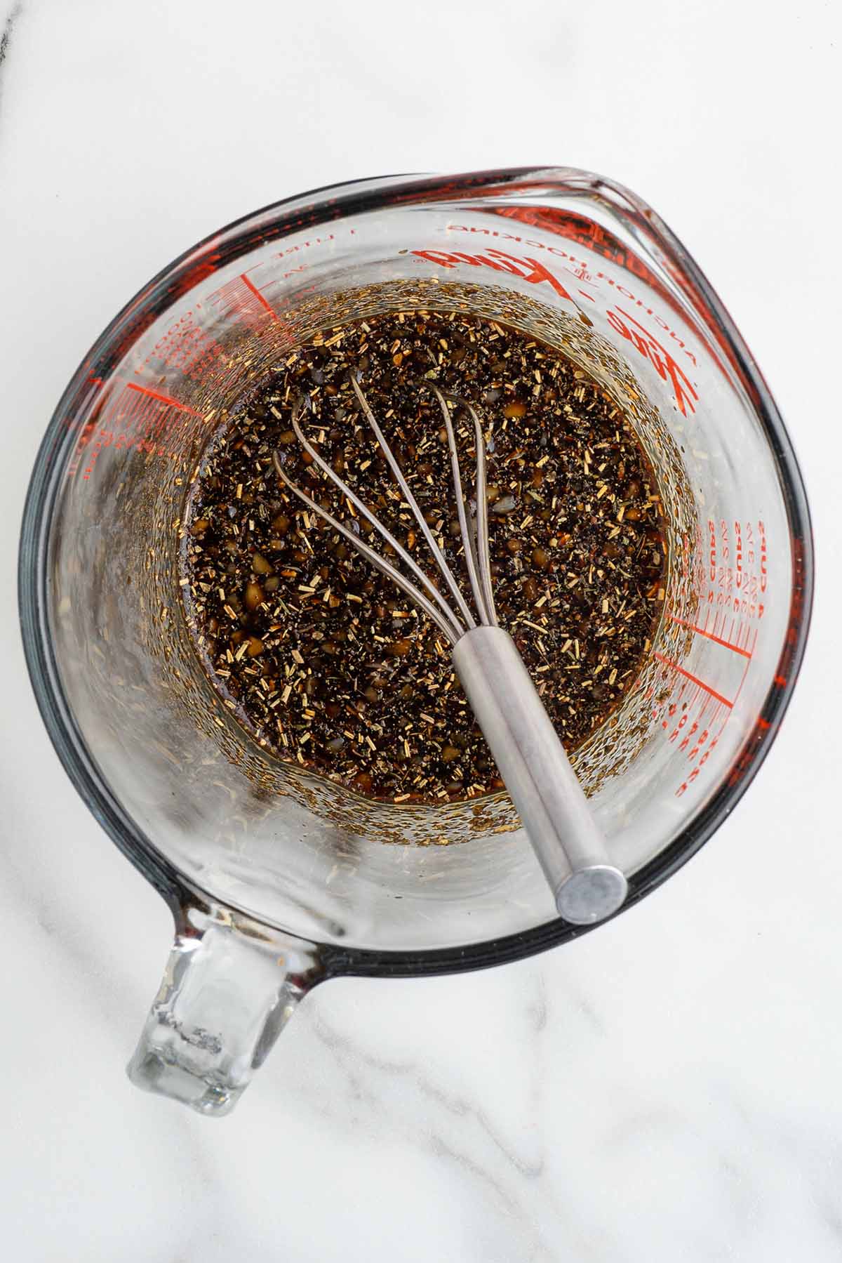 Balsamic glaze, lemon juice, honey, minced garlic, Italian seasoning, salt, and pepper in a small bowl with whisk.