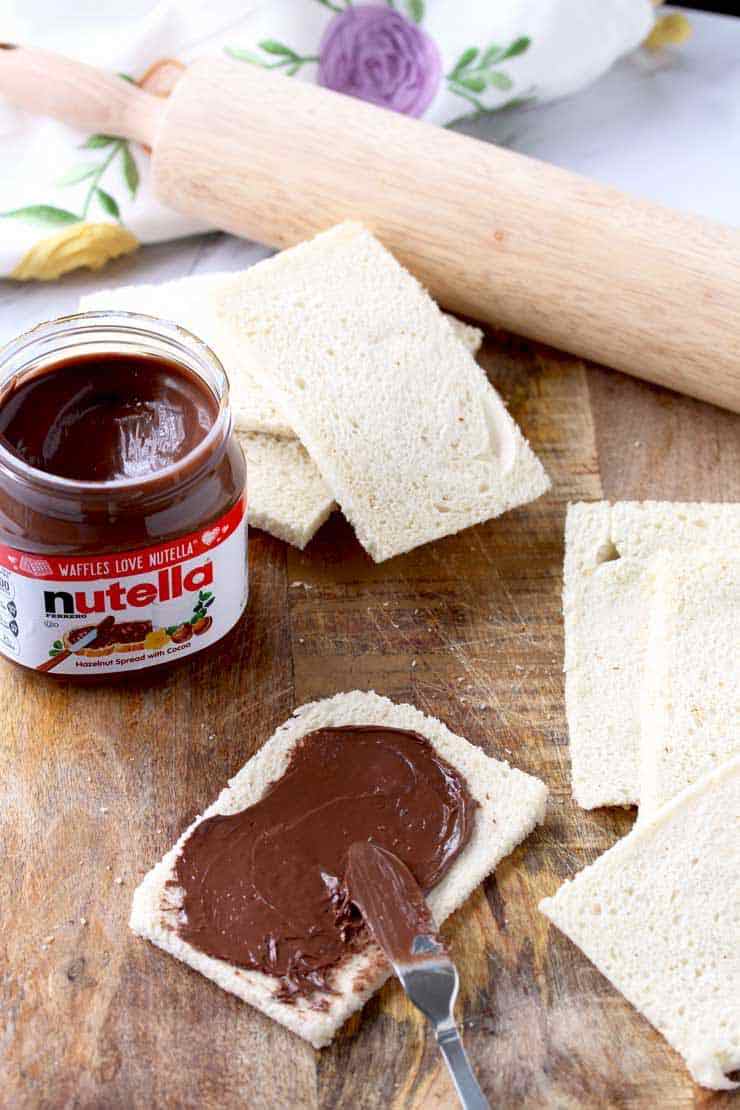 Flattened bread spread with Nutella.