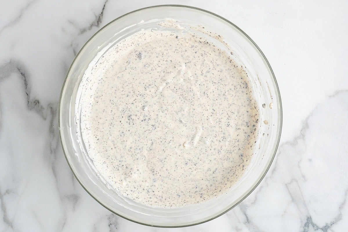 Cookies and cream filling mixed in a bowl.
