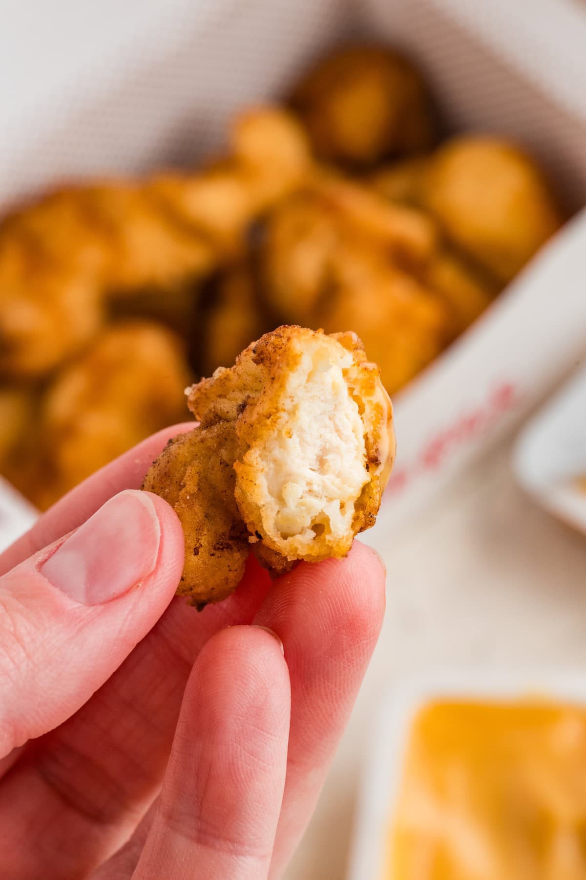 Enjoy the crispy, juicy nuggets while they're hot.