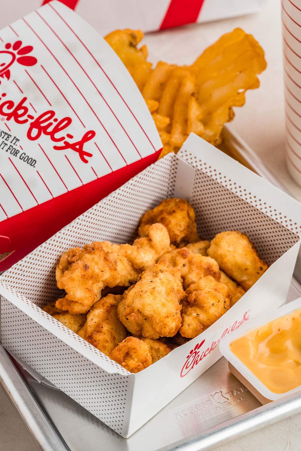 chick fil a nuggets inside a takeaway box
