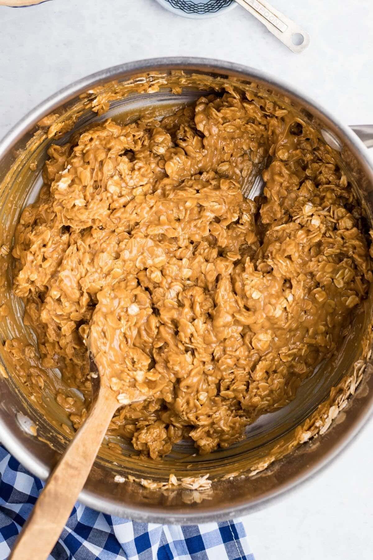 add the oats into the pan and mix well. 
