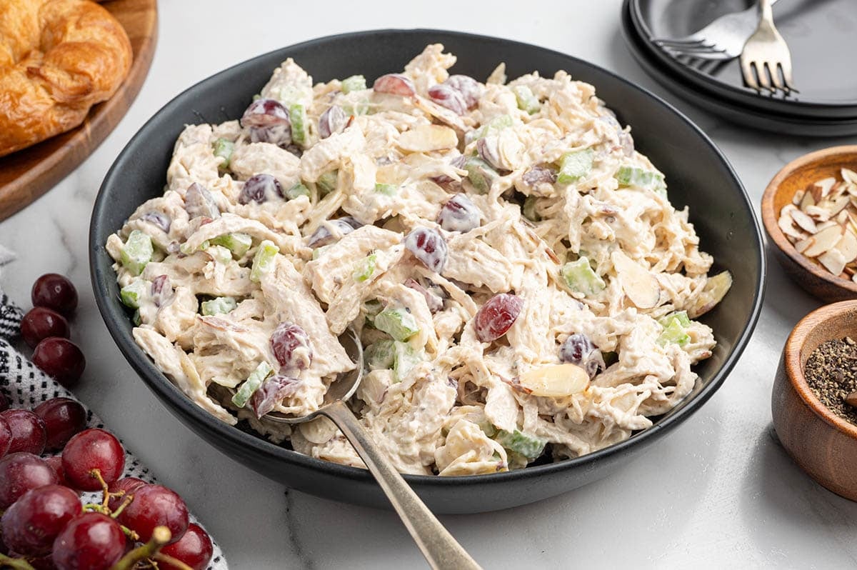 chicken salad in a black plate. 