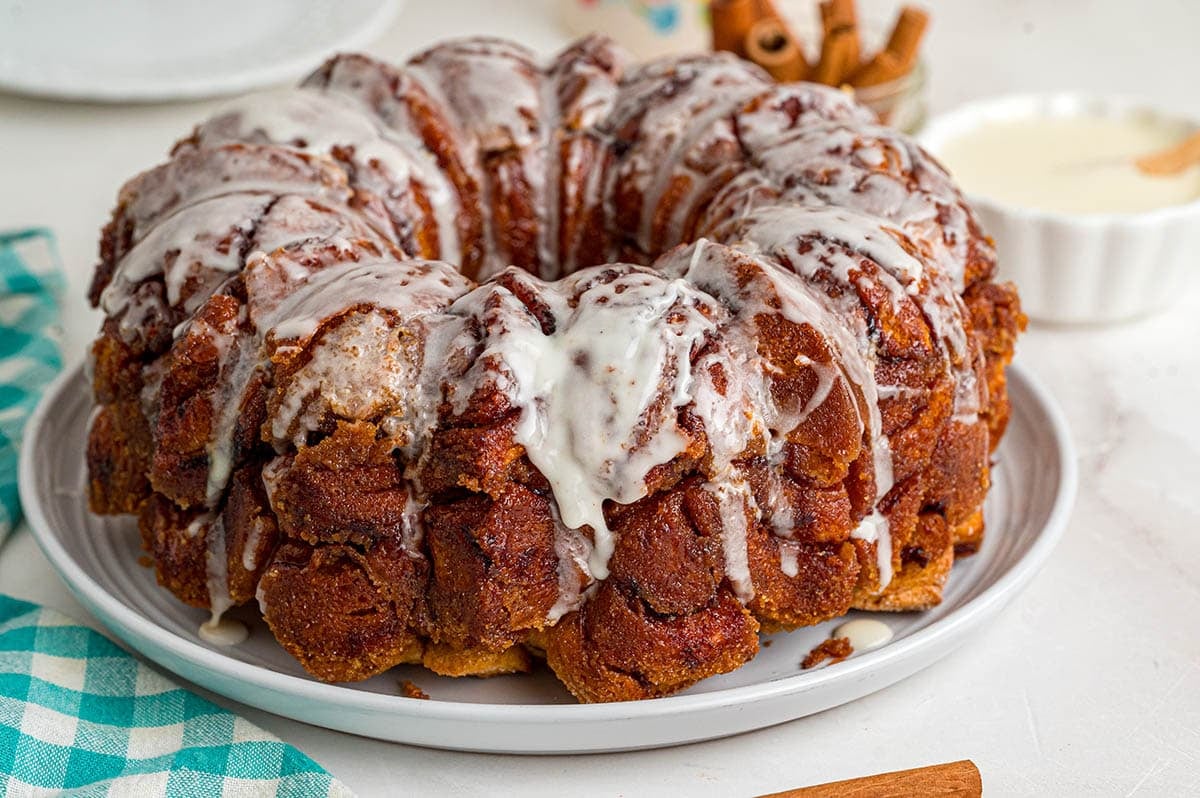Glazed cinnamon roll monkey bread with a crisp, caramelized cinnamon coating.