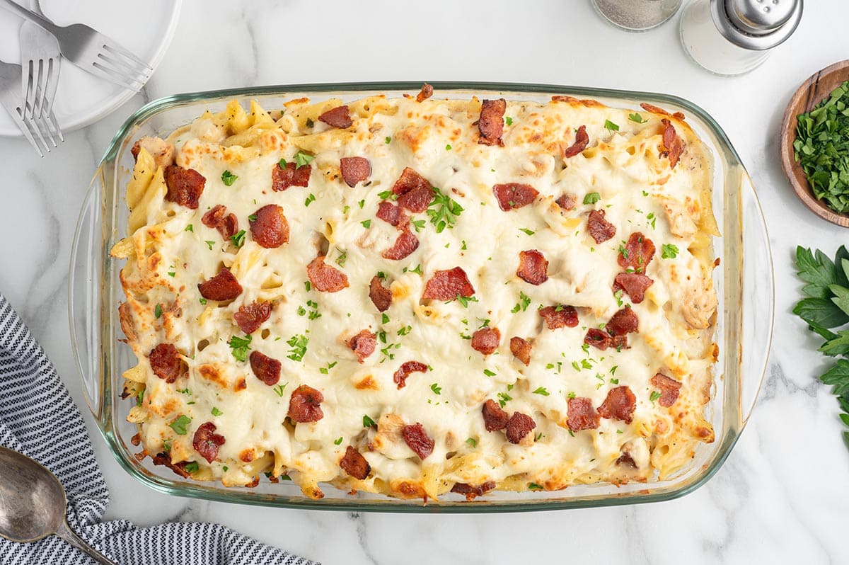 Bake until the casserole is hot and bubbly and the cheese is melted and lightly golden. Garnish with fresh parsley and serve warm.