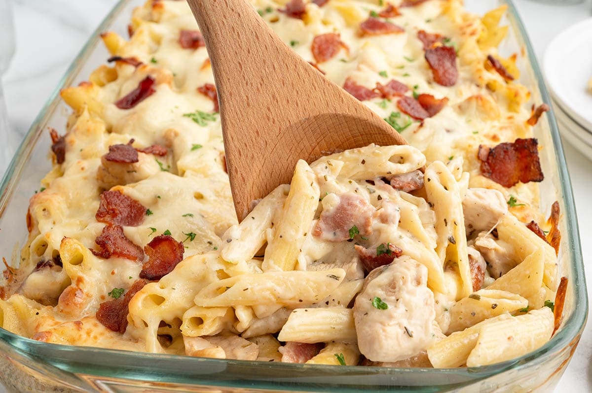 Scoop into this creamy Chicken Bacon Ranch Casserole loaded with tender chicken, penne pasta, crispy bacon, and plenty of melted cheese.