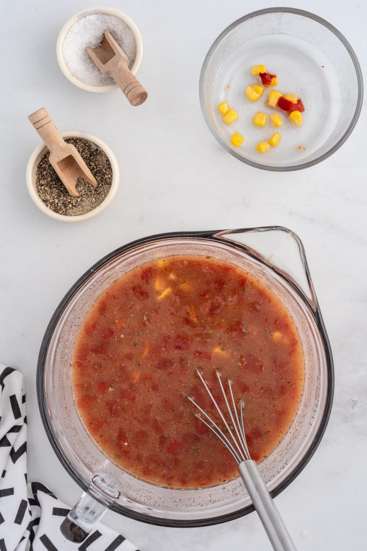 mix the broth ingredients for crack chicken chili.
