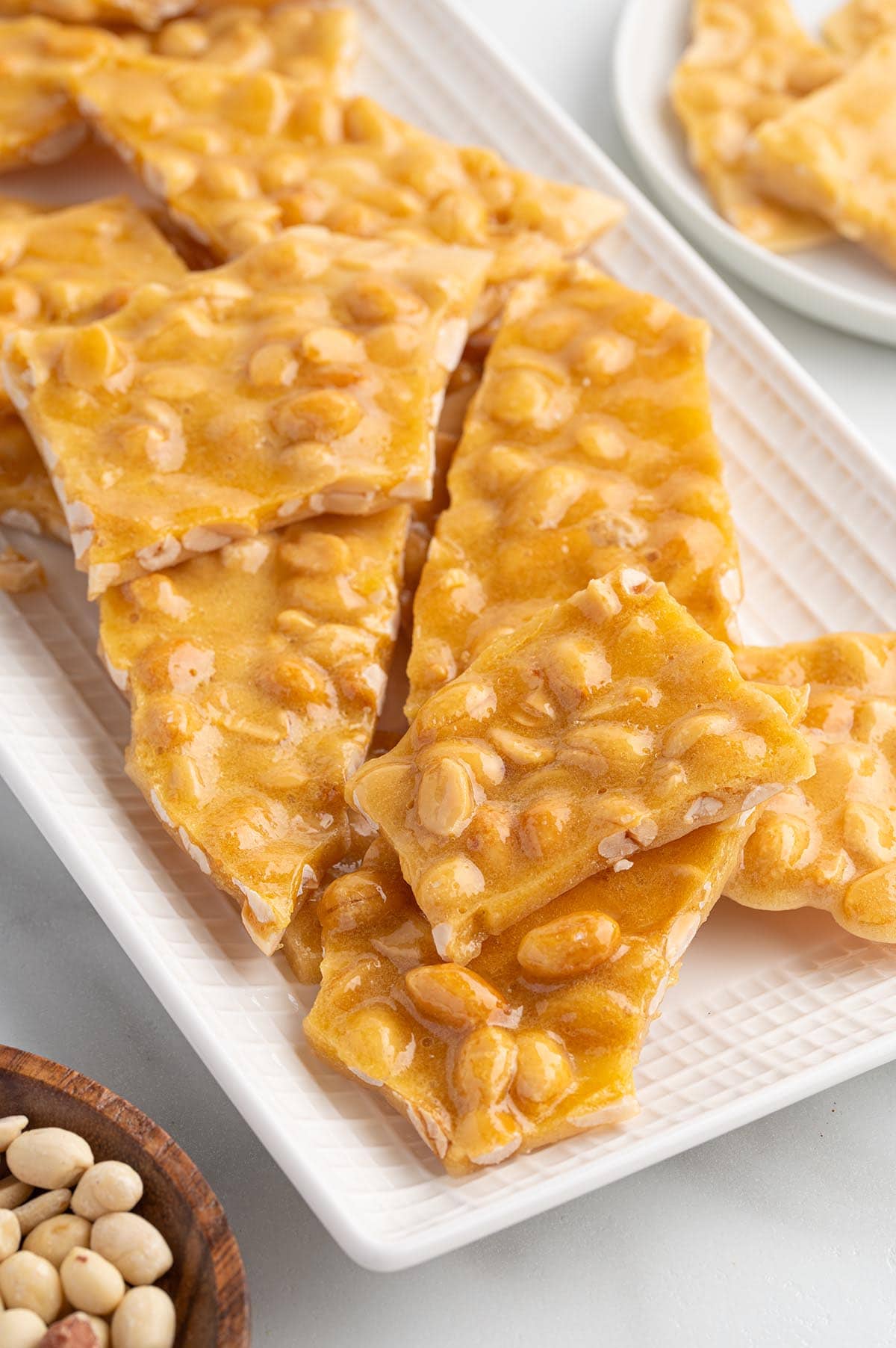 microwave peanut brittle on top of rectangle plate. 