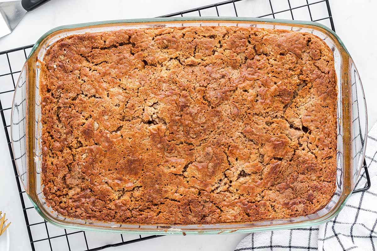 Baked pumpkin dump cake with a golden, crisp cake topping.