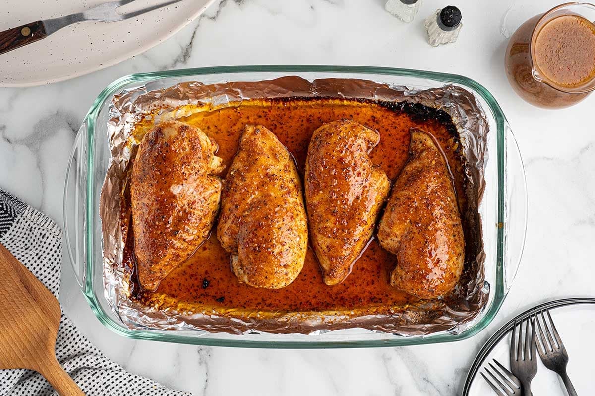 Italian chicken breasts baked in a seasoned sauce.