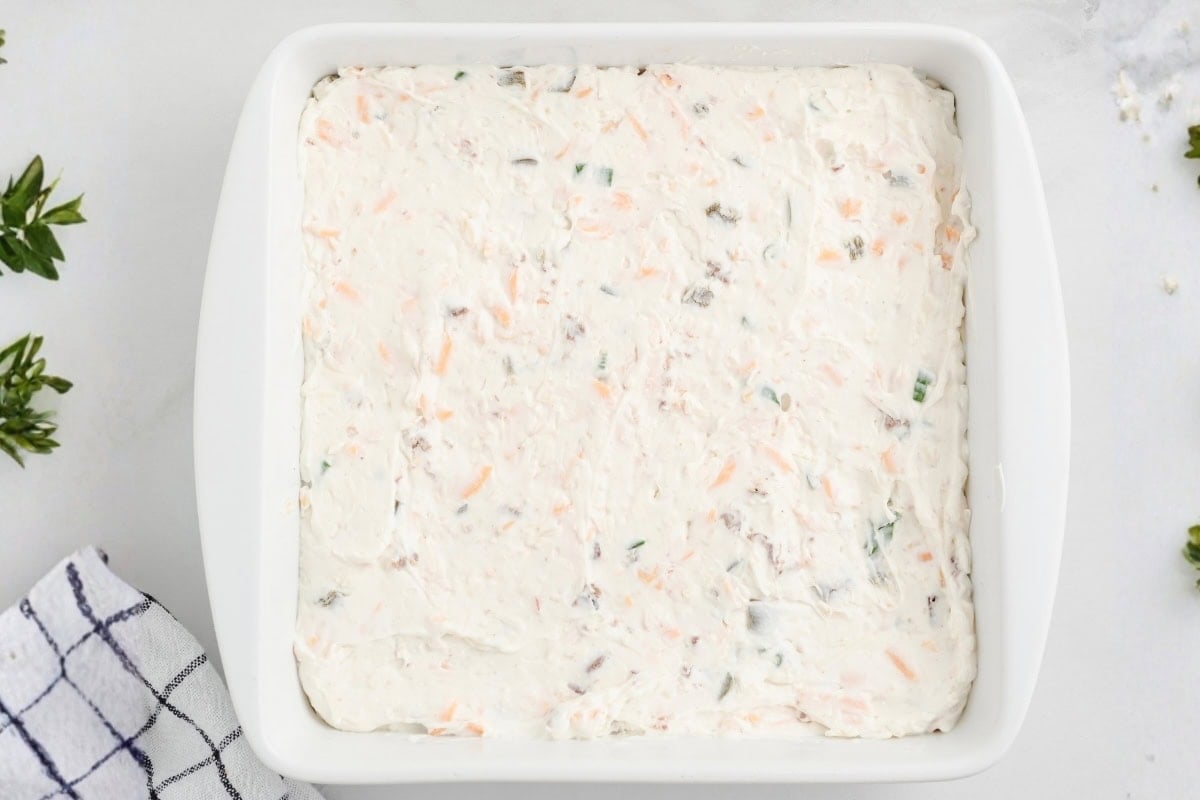 alapeño popper dip topped with breadcrumbs before baking.