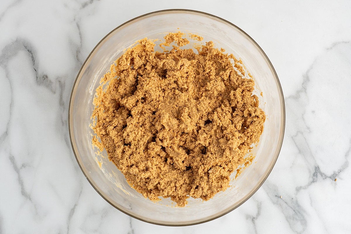 mixing the base ingredients for peanut butter bars. 