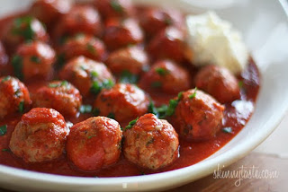 A bowl of food on a plate, with Meatball and Soup